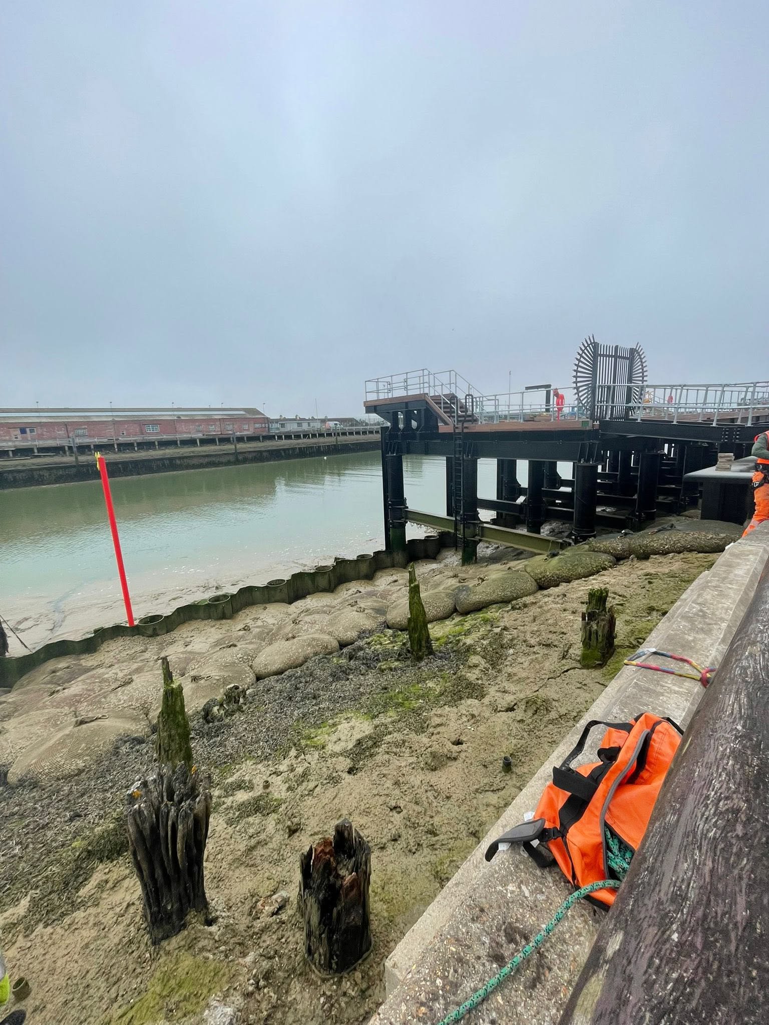 The harbour foreshore with the remaining piling stumps to come out